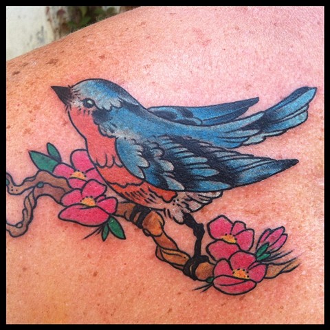 Bluebird on her shoulder...