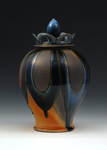 Soda Fired lidded jar with crown and finial top