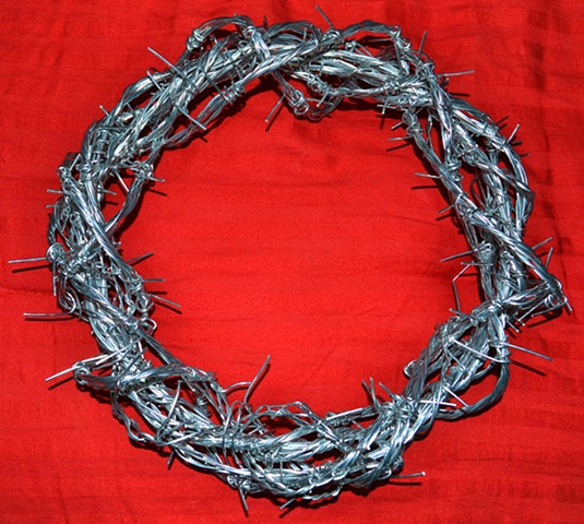 John 19.2 "The soldiers twisted together a crown of thorns and put it on his head." Thorns represent curses throughout the scriptures and Jesus took all the curses of the world upon his head so we don't have to. 