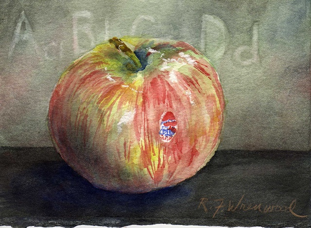 a MacIntosh apple with blackboard behind
