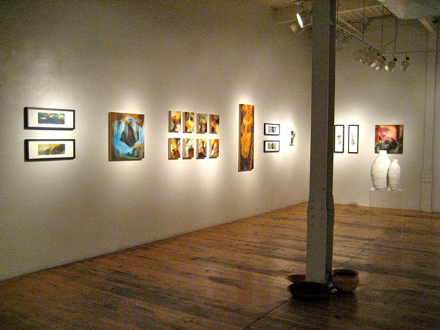 Another long view of the gallery space with works on display.