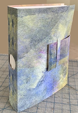 May 2023 Blue Yellow Cover with Hole in Spine