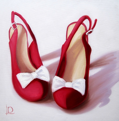 Do the two step with these red slingback shoes complete with white bows on the toes, by Brighton artist Linda Boucher