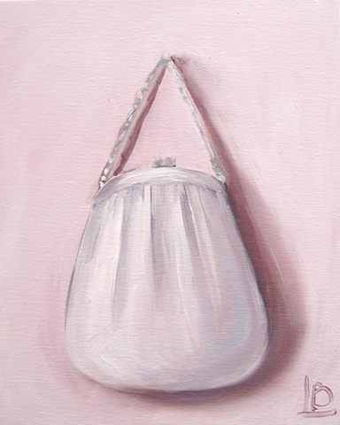 silver purse painted in oil paint by Brighton Artist Linda Boucher, in her art studio and gallery in Kings Road Arches, part of the Brighton Seafront Artist Quarter.
