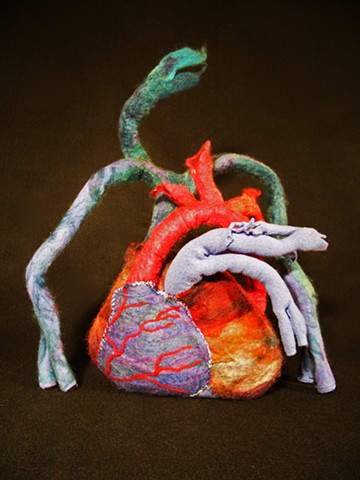 Mixed media sculpture of a human heart by Marie Bergstedt