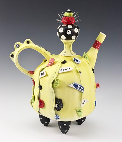Fanciful porcelain teapot with dressmaker's details by Laura Peery