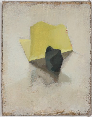 rock, yellow paper