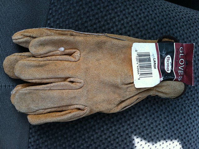 14. unused gloves from under the drives side seat