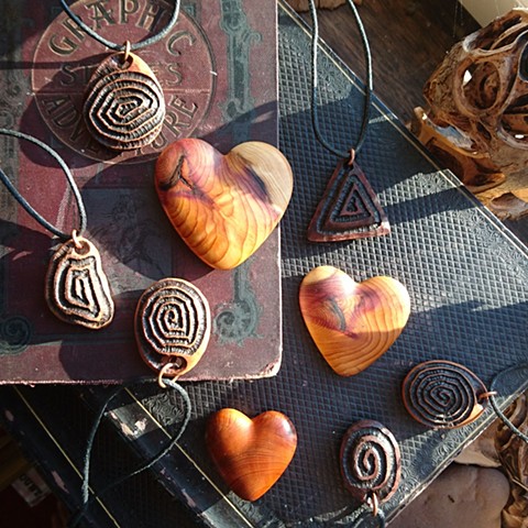 Hawthorn pendants and yew heart tokens
