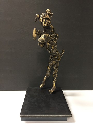 Bronze sculptureof dog dancing