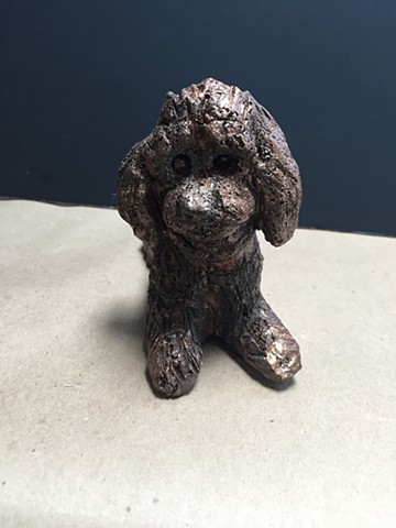Ronnie, the toy poodle sculpture in bronze