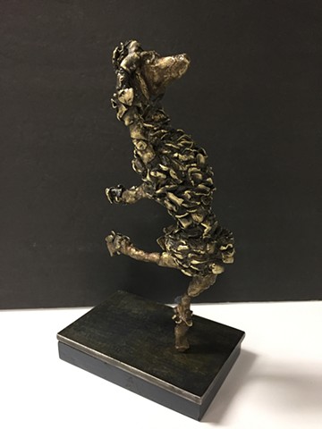 Bronze sculpture of dancing poodle