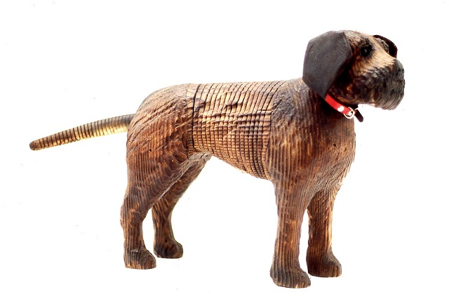 Wooden articulating dog by Jeff Soan 