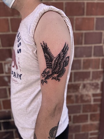 Eagle arm tattoo black and grey 