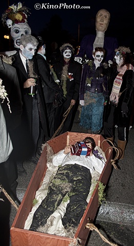 Squeezebox in coffin.  He was pulled the entire route by friends.