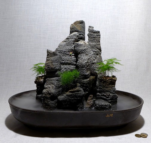 feather rock fountain with miniature climber, waterfall, fogger, and ferns