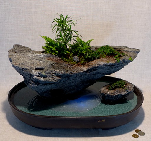 feather rock fountain with fogger, mixed plantings, miniatures, and waterfall