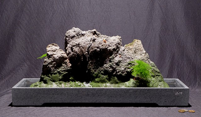 feather rock fountain in Corian tray, with miniature rock climber
