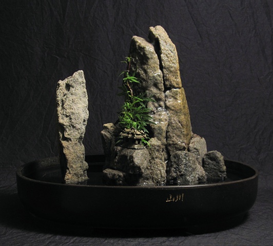tabletop fountain with feather tock spires and temple miniature