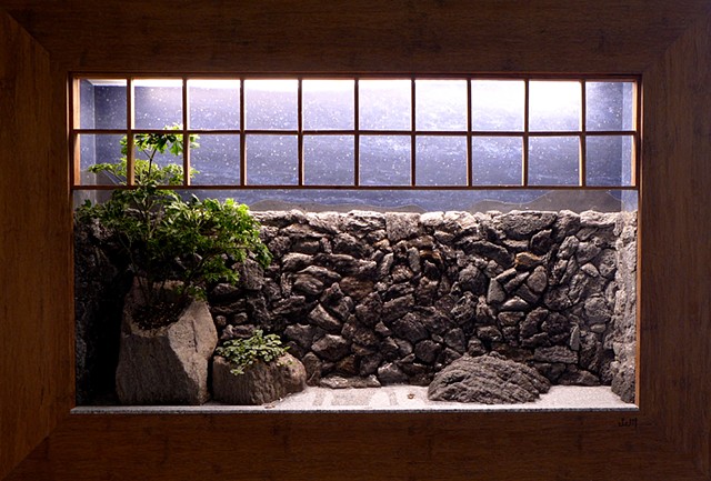 tsuboniwa wallscape with waterfall and plants