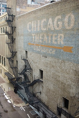 Original ghosted sign on the side of the Chicago heater building in downtown Chicago photographed by lucy mueller photography