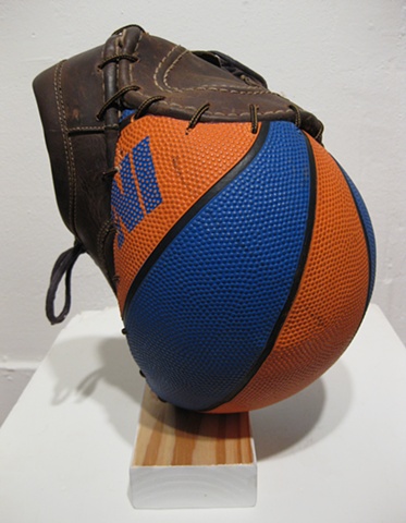 Title/Materials: Basketball, Artist's Shoes, Shoe Laces, Block of Wood, Paint