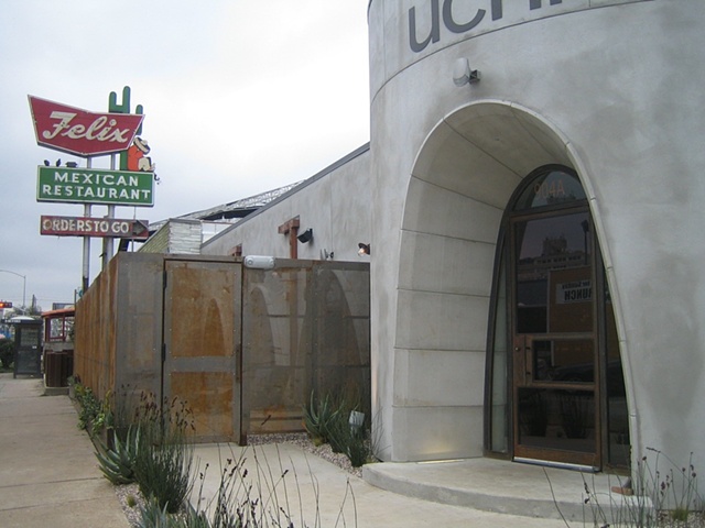Uchi Front Facade with Steel Door and Steel Patio Fence