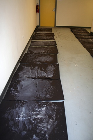 The pre-made large ink blots were set out for the youth artists to select