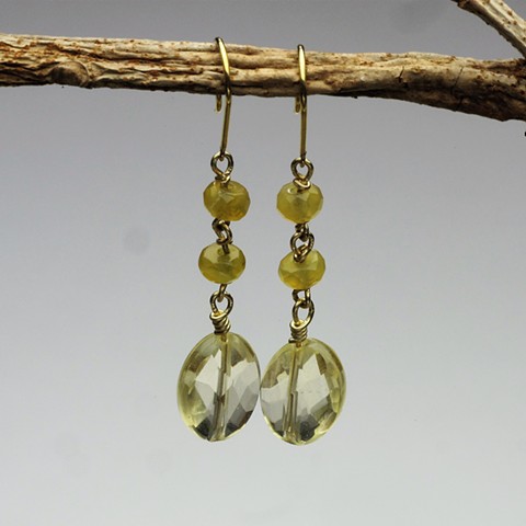 delicate: a faceted citrine bead is suspended from 2 wire wrapped small faceted yellow opal rondels on an 18KT ear wire (! 1/2") (#309E)