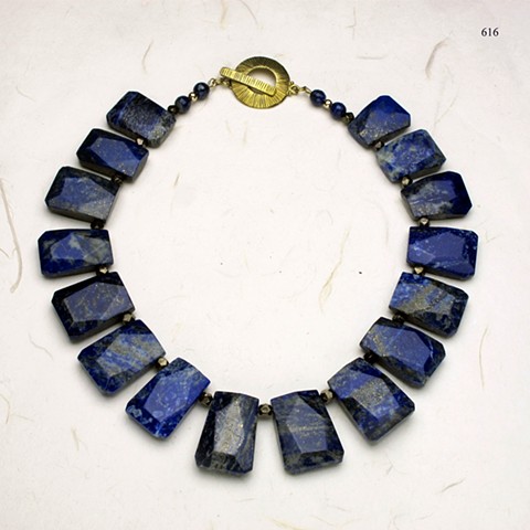 beautiful lapis collar of faceted stones accented with faceted pyrite and finished with a brass toggle (#616)
