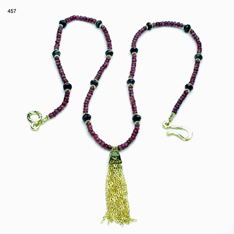 faceted rubies w/ 2" g/f chain tassel, g/f findings
(24") (#457)