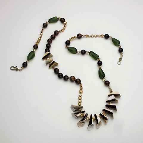 a  fun 36" string of shells, buri beads, dyed freshwater pearls and vintage glass finished with a vermeil clasp (#871)