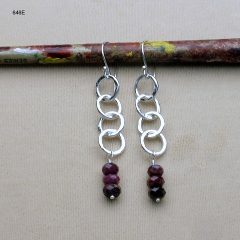 s/s hammered rings w/ faceted ruby rondels on s/s ear wire (#646E) for coordinating necklace, see "Y" necklace of silver rings and ruby rondels (#646)  