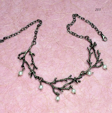 a natural beauty: 3 oxidized silver branches w/ dangling pearls, finished with oxidized silver chain and lobster clasp that allows adjustable fit  (#203)