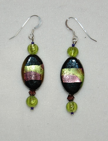 Earrings of black oval glass with green and amethyst foil, green murano-style glass beads and amethyst crystal beads