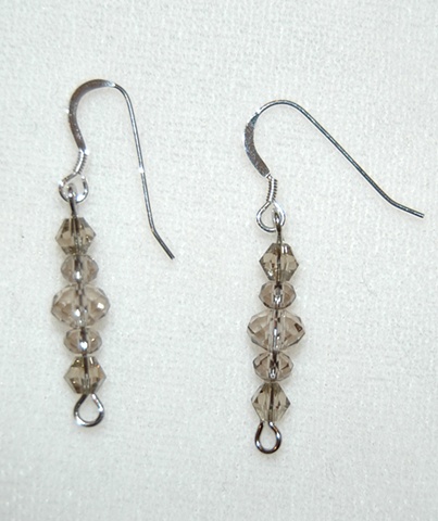 Smoky Brown/ grey crystal beaded Earrings in faceted rondell and cone shapes of varying sizes