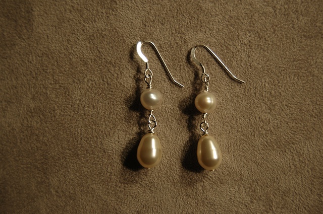 Swarvoski Cream-colored Glass Pearl Earrings with natural freshwater pearl accent on sterling silver ear wires.