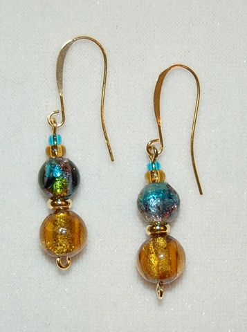 Amber foil lined glass bead Earrings, round in shape, accented with murano style glass bead in dramatic mix of aqua/green/purple, gold plated heishi spacer and aqua and amber glass seed beads 