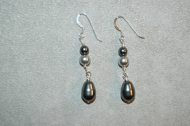 Swarovski Dark and Light Grey Glass Pearls, Tear-drop and round shape on Sterling Silver ear wires.