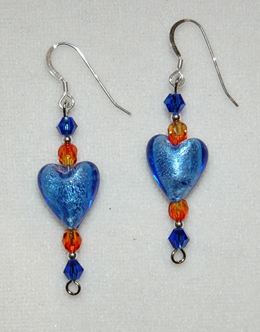 Heart shaped cobalt blue murano style glass earrings with crystal bead accents