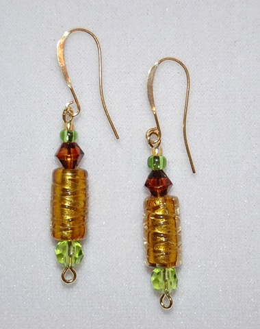 Amber colored foil lined glass bead Earrings, tube shaped, accented with cone-shaped topaz crystal and faceted green glass