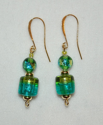 Earrings of focal bead of green/aqua foil glass accented with Murano style glass bead mix of green/aqua/gold with gold plated heishi spacers 
