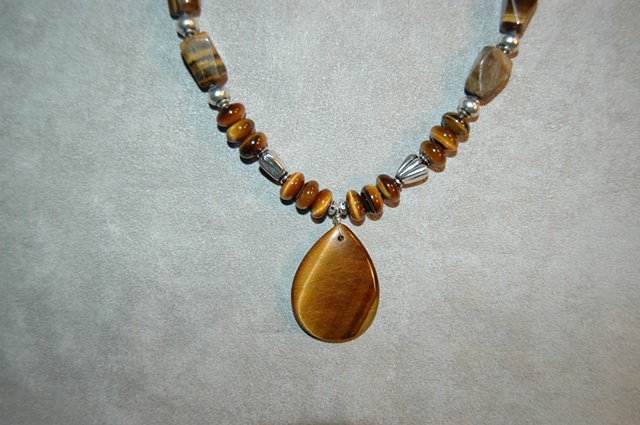 Tiger Eye Pendant Necklace with Rondell-shaped and faceted Tiger Eye, Silvertone accents with Sterling silver clasp