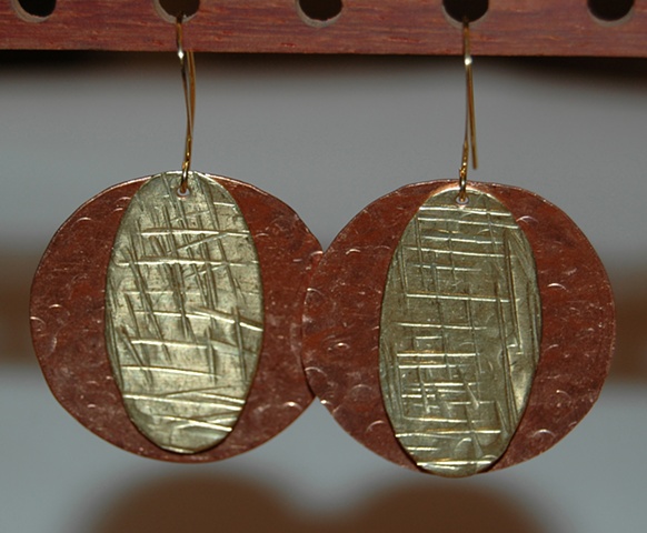 Oval-shaped hammered/incised brass over hammered copper disc Earrings