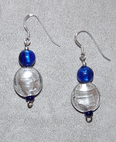 Earrings of  Murano style glass beads in silver puff coin shape and cobalt blue round on Sterling silver French ear wire