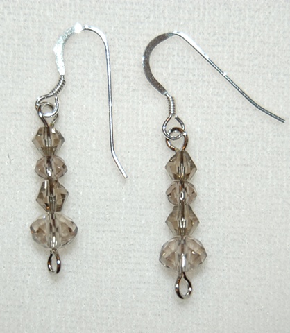 Smoky Brown/ grey crystal beaded Earrings in faceted rondell and cone shapes 