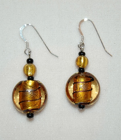 Foil-lined amber glass puff coin shape Earrings accented with round amber Murano style glass 