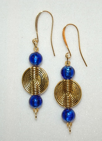 Gold-tone spiral Earrings accented with round cobalt blue murano style glass beads