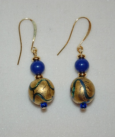 Earrings of incised gold foil over cobalt blue glass bead, round in shape, accented with round cobalt blue glass bead and gold-plated heishi metal spacers 