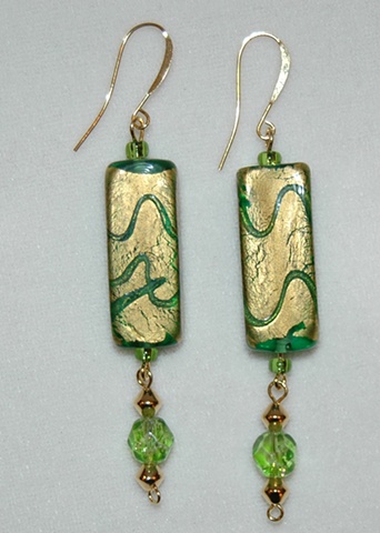 Incised gold foil over green glass Earrings accented with faceted green glass and gold accent beads